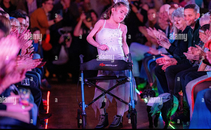 Young Girl with Muscular Dystrophy Shines on Fashion Runway at Bristol Event