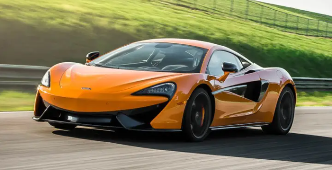 Two Seriously Injured After McLaren Crashes Into Lancashire Home and Catches Fire