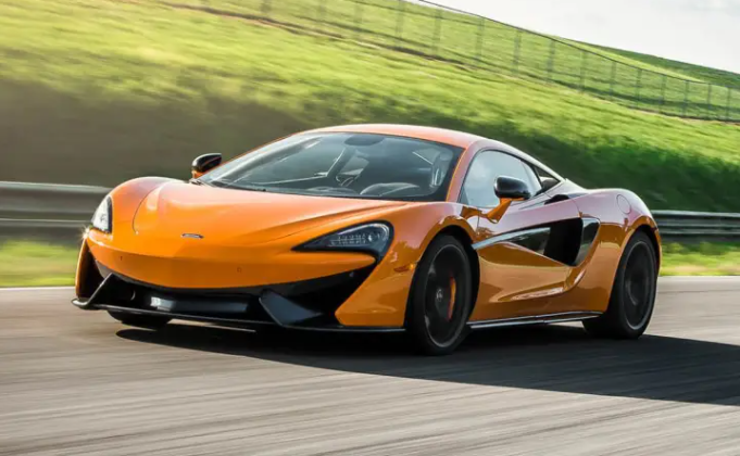 Two Seriously Injured After McLaren Crashes Into Lancashire Home and Catches Fire