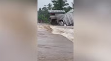 House Collapses in Floodwaters as Philippines Faces Torrential Rains