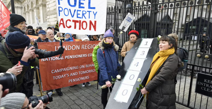 Protesters Honor Cold-Related Deaths with Coffin at Downing Street