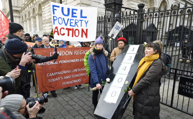 Protesters Honor Cold-Related Deaths with Coffin at Downing Street
